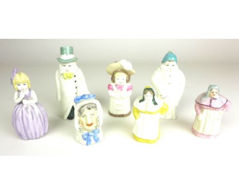 A group of seven Royal Worcester porcelain candle snuffers, comprising two French Cooks, in two colourways, Welshwoman, Feath