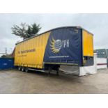 A Farlow Tri Axle Curtainside Step Frame Trailer (2018), liveried curtains.