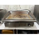 A Nisbets Essentials DA397 Electric Countertop Griddle, 55 x 35cm.