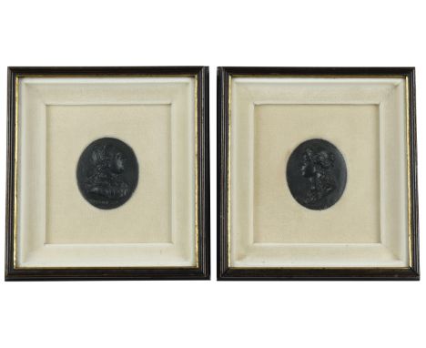 George III and Queen Charlotte, a pair of uniface oval portrait medallions by Wedgwood, in black basalt, armoured bust of Geo