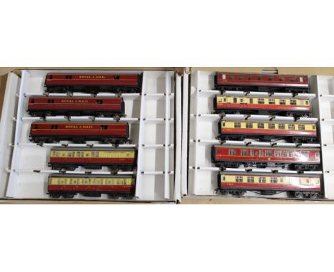 Two boxes with four trays each containing various Hornby Dublo tin plate carriages and odd tenders, twenty one items (mild pl