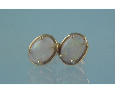 A pair of 9ct gold opal set earrings