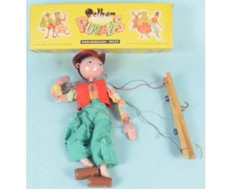 A vintage boxed Pelham cowboy puppet