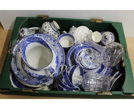 A box of assorted blue and white china including plates, jugs, cups and saucers etc plus two decanters 