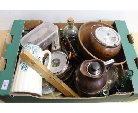 A box of mixed items including a Bakelite jug, antique glass bottle, barometer etc