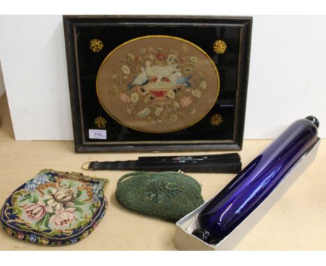 A 19th Century hand embroidered panel of doves in original frame, two vintage evening bags, a fan plus a 19th Century blue gl