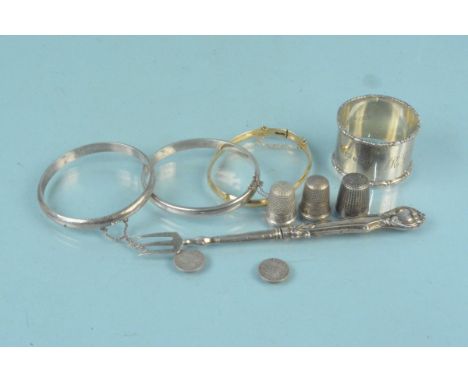 Mixed silver to include a napkin ring, two thimbles, two bangles plus a Charles Horner silver clad thimble, a 9ct gold metal 