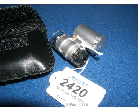 A Collector's Cased LED Illuminated 60X  Magnification Lens & UV Lamp.