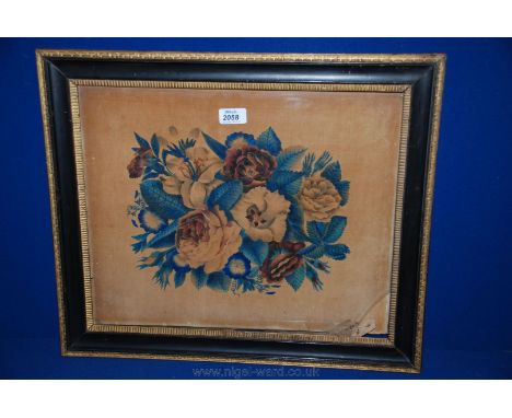 A Victorian Print on velvet of flowers, in a darkwood and gilt effect frame, a/f 17 1/2'' x 14 1/2''.