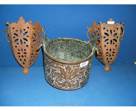 A pair of Moroccan style lamp shades and a beaten Copper coal bucket with bird and floral detail.