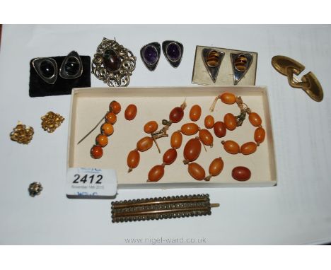 A honey amber bar Brooch, loose amber Beads, opal brooch, etc.