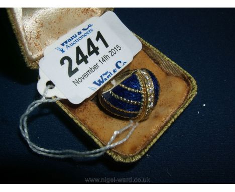 A 14k Gold and blue Enamel and Diamond dome Ring.