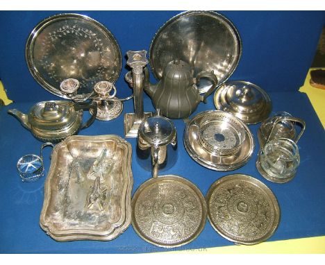 A large quantity of plated items including teapots, serving dishes, pickle servers, column candlestick, candelabra, two heavy