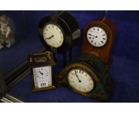  An Asprey clock  , a mantle time piece in hammered case, an oak mantel clock Mappin and Webb and Matthew Norman carriage clo