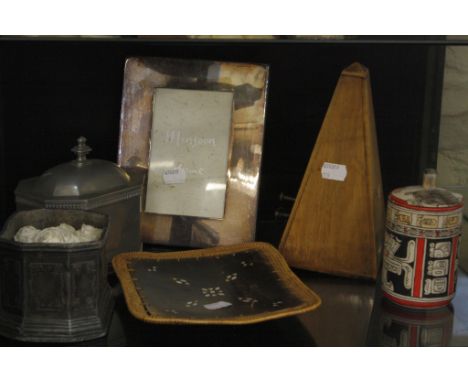  A miscellaneous collection of items   including a metronome, silverplate photo frame, wooden boxes, Middle Eastern vase , te