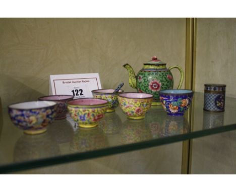  A Chinese miniature enamel teapot  , 8cm high (af), six assorted miniature tea bowls, and a cloisonnie cylindrical lidded po