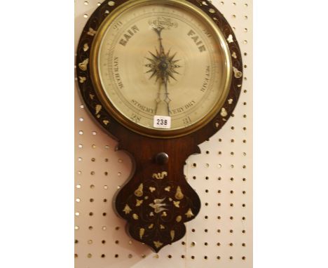  A 19th Century mother of pearl inlaid wheel barometer  , 104cm  