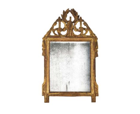  ITALIAN NEOCLASSICAL GILTWOOD MIRROR EARLY 19TH CENTURY the rectangular mirror plate in a bead moulded frame with a pierced 