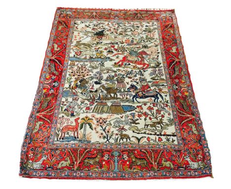 HUNTING DESIGN RUG, 202cm x 135cm, all over design on an ivory field within complimentary bands and borders.