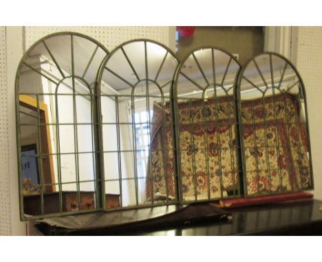 ARCHITECTURAL STYLE GARDEN MIRRORS, a set of four, verdigris metal, 49cm W x 77.5cm H. (4)