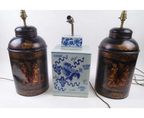 TABLE LAMPS, comprising a pair of tole tea canister style examples 40cm H and a Chinese cube ceramic lamp, 35cm H, plus shade