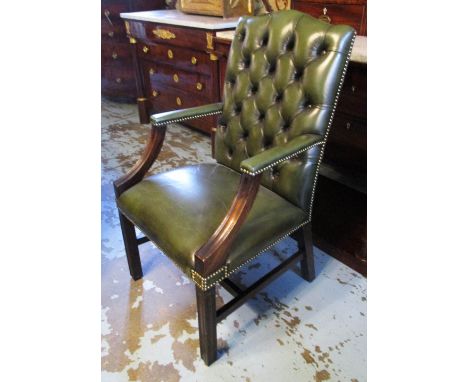 OPEN ARMCHAIR, in a button back green leather with studded detail, 61cm W x 57cm D x 107cm H. 