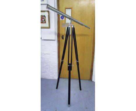 TELESCOPE, in chromed finish on extendable tripod wooden supports, 160cm H. 