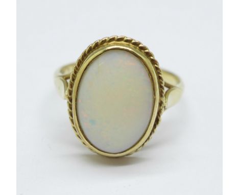 A 9ct gold and opal ring, 2.9g, Q, 14mm x 10mm 