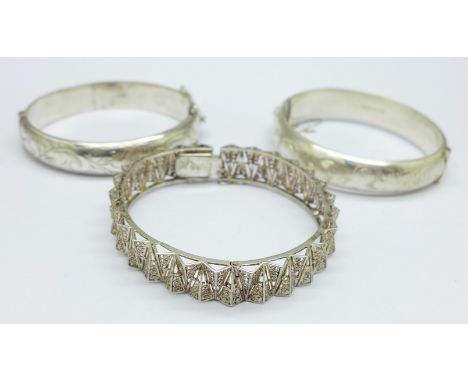 Two hallmarked silver bangles and an 800 silver filigree bangle, 56g 