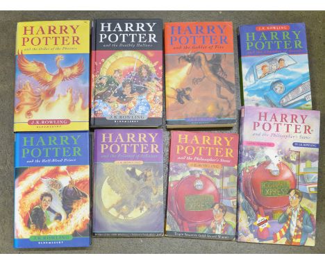 A set of Harry Potter books including three later First Edition books and a Harry Potter audio book