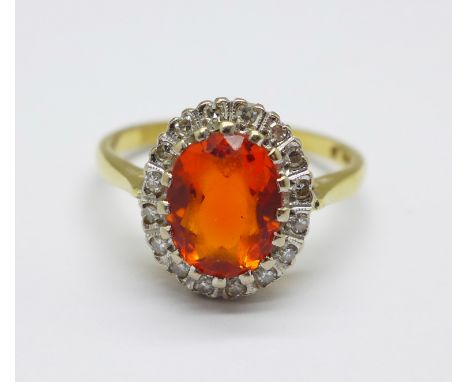 An 18ct gold, diamond and fire opal ring, 3.5g, N 