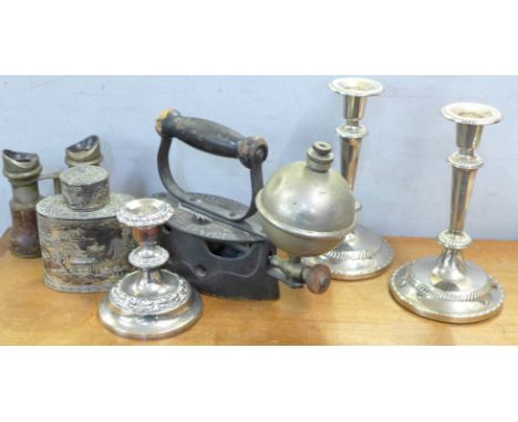 A self-heating comfort iron, a Chinese tea caddy, candlesticks and opera glasses 