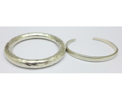 A hammered 925 silver bangle and a hallmarked silver bangle bearing inscription, 68g 