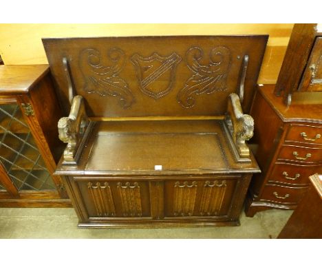A carved oak monk's bench