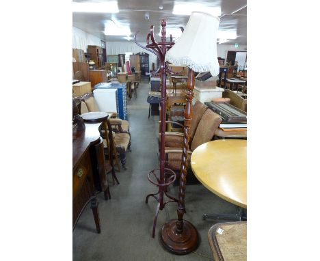 A barleytwist standard lamp and a bentwood coat stand