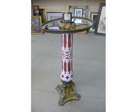 A Victorian Palmer & Co. Patent gilt metal, cranberry and opaline glass table lamp