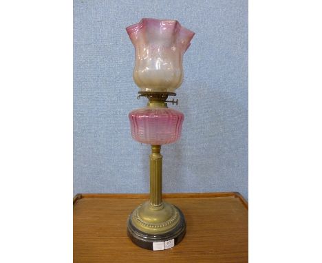 A Victorian brass oil lamp