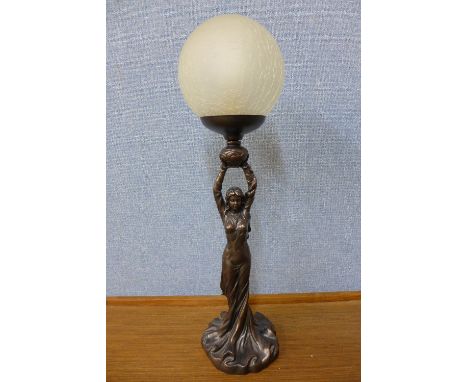 An Art Nouveau style figural table lamp