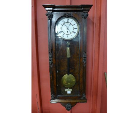 A 19th Century walnut Vienna single weight wall clock