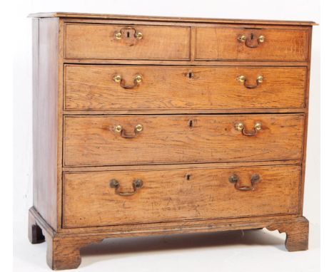 An early 19th century George III mahogany chest of drawers. The chest featuring a set of two short over three drawers, with c