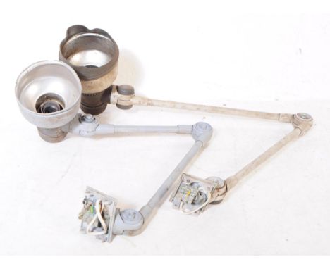 Two vintage 20th Century industrial machinist / workmen's anglepoise mounted desk lamp lights. One by Cutler - Hammer. The la