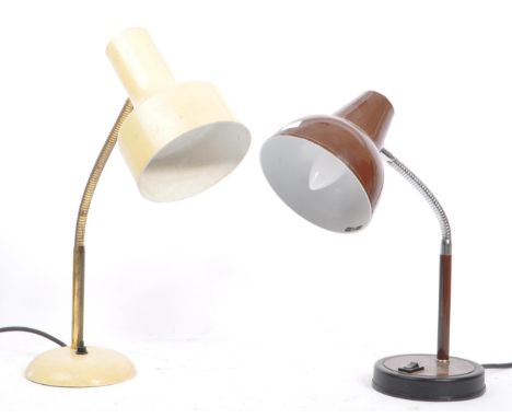 Two mid 20th century adjustable desk top lamps. Each lamp having an adjustable bending arm, connecting the base to the lamp s