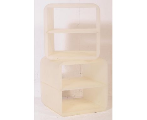 Two retro late 20th century Ikea storage cube / bedside tables. The tables being of translucent plastic construction in the f