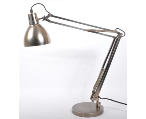 A late 20th century anglepoise style desk / table lamp light. The lamp finished in natural aluminium colourway, having an alu