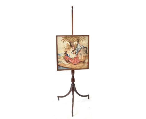 A George III 19th century mahogany tapestry needlepoint adjustable pole screen. The screen depicting baby Jesus, Mary &amp; J