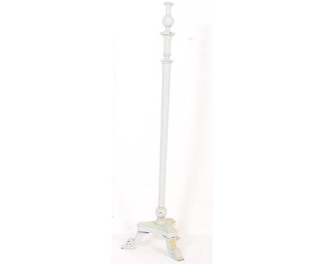 A vintage 20th century painted floor standing standard lamp light. With a turned central tapering column, with some reeded de