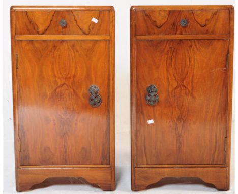 A pair of vintage 20th century post-war Art Deco walnut veneer bedside table / cabinets. Of square form with single drawer ab