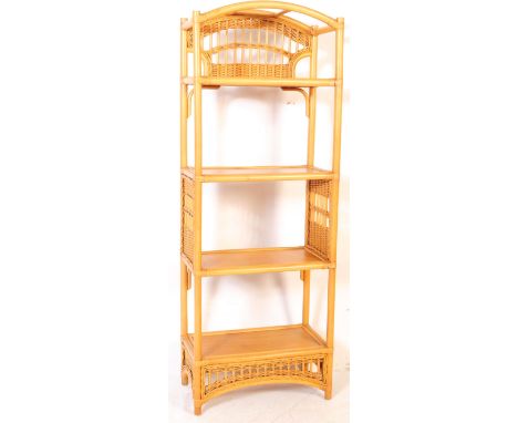 A vintage mid 20th century bamboo, cane and rattan bookcase / shelf wall unit / display stand. Four shelves with arched top a