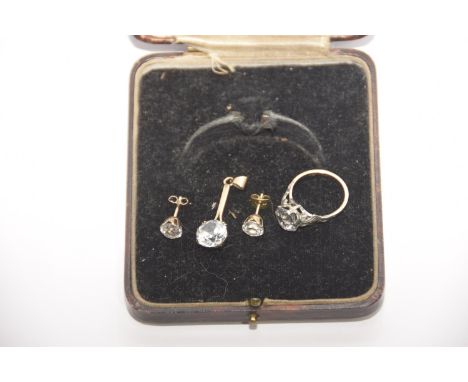 A suite of paste jewelleryTo include a paste ring, pendant and pair of stud earrings, stamped 9ct, total weight approx. 6.7g.