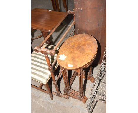 A nest of three walnut tea tablesOn slender ring turned supports and a Victorian beech wood towel rail. (2) 
